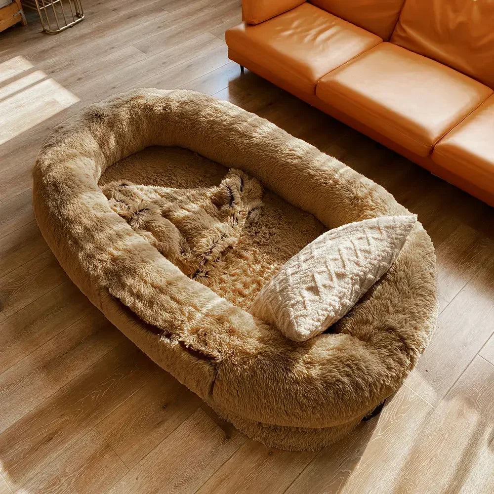 A giant plush sponge dog bed for human use to keep warm in winter as a pet bed. People and dogs share leisure mattresses